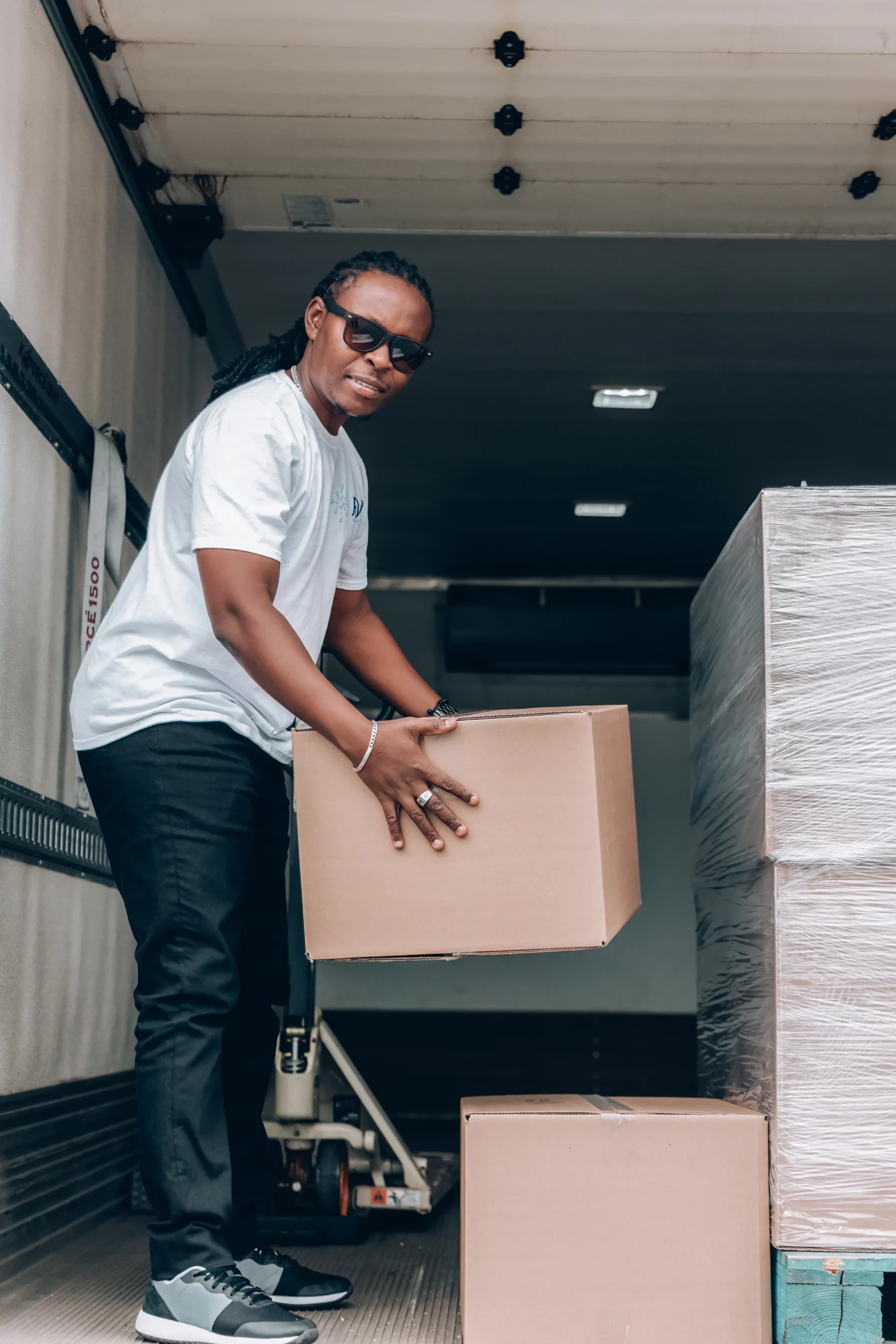 frozen food shipping man discharging truck scaled 1